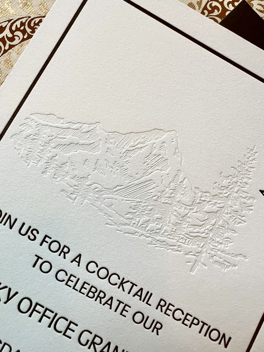 Blind debossed event invitation with a mountain motif and a dark brown envelope, image 3 of 6