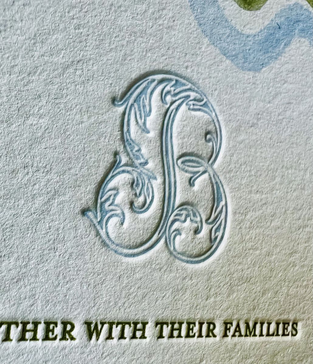 Letterpress wedding invitation suite with a wavy blue and green scalloped border and a monogram, image 8 of 17