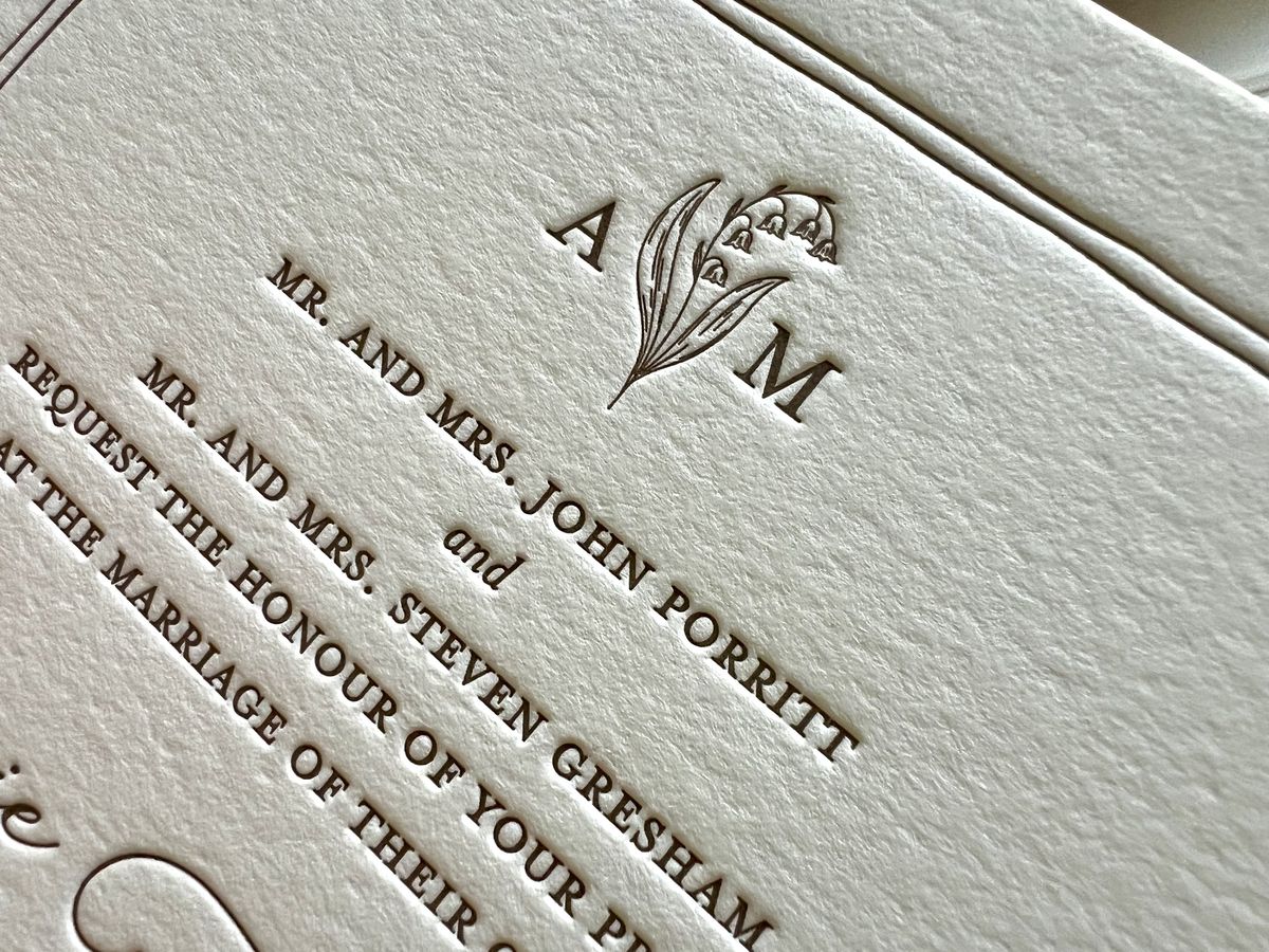 Letterpress wedding invitation suite in pink and green with a painted landscape, image 7 of 8