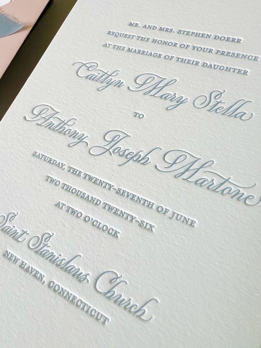 Letterpress wedding invitation suite in dusty blue on cream cotton paper with a blush envelope, image 2 of 6