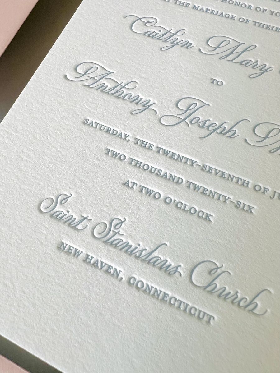 Letterpress wedding invitation suite in dusty blue on cream cotton paper with a blush envelope, image 3 of 6