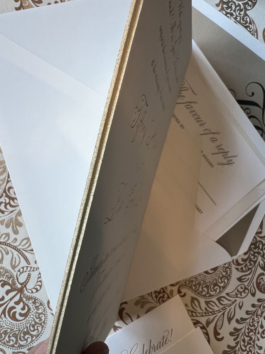 Letterpress wedding invitation suite in gold and cream with a patterned envelope liner, image 8 of 9